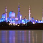 One of the most magnificent structures I have ever seen...the Sheikh Zayed Mosque in Abu Dhabi on the Arabian Gulf is lit up at night, but the color will vary depending something to do with the moon (If anyone knows, please tell). This was taken at night (obviously), with a very long exposure.A bit more from Wikipedia:Sheikh Zayed Mosque in Abu Dhabi is the largest mosque in the United Arab Emirates and the sixth largest mosque in the world. It is named after Sheikh Zayed bin Sultan Al Nahyan, the founder and the first President of the United Arab Emirates, who is also buried there. The mosque was officially opened in the Islamic month of Ramadan in 2007.Although it is illegal for non-Muslims to enter mosques in the United Arab Emirates, this mosque will be an exception. The Abu Dhabi Tourism Authority announced that tours of the mosques will be given to both Muslims and non-Muslims beginning in mid-March 2008 in order to promote cultural and religious understanding.